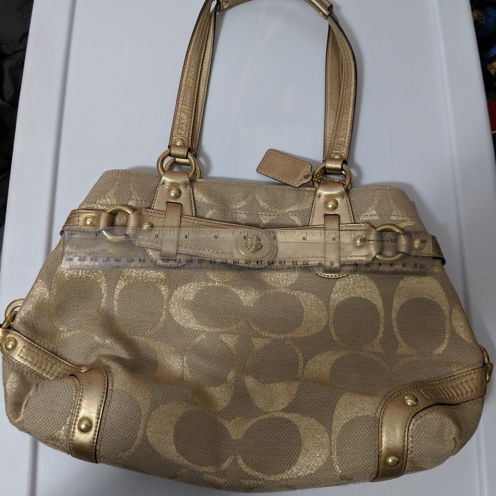 Signature gold coach purse